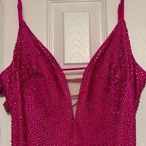 Pink, rhinestone gown. Worn once. Purchased for $500.